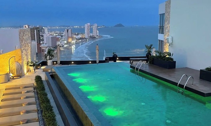 Zona Dorada Condo | 2-bedroom condo in serene Mazatlán with AC, fitness room. Live it up