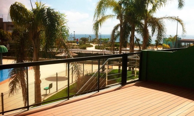 Torre de la Horadada Apartment | 2 bedroom apartment on the 1st line of the sea and community pools.