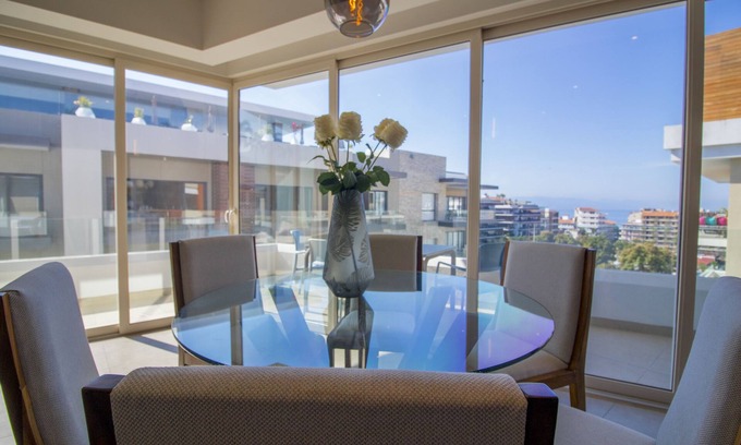Emiliano Zapata Condo | 2BD/3BA Wrap Around Terrace Rooftop Pool Gym and Parking