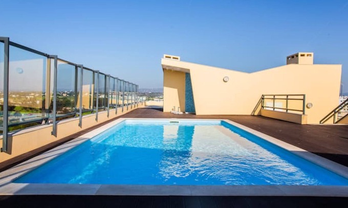 Olhao Apartment | 2Bed Flat w/Rooftop Pool in Marina Village, Olhão