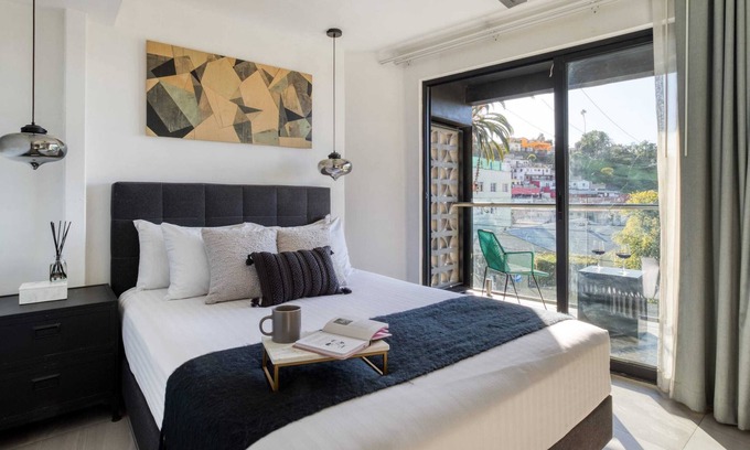 Centro Apartment | 2BR Apt w/ Balcony | Rooftop+FirePit+Gym+Lounge
