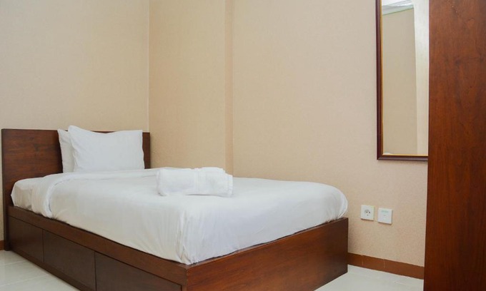 Pondokcina Apartment | 2BR Taman Melati Apartment near Universitas Indonesia By Travelio