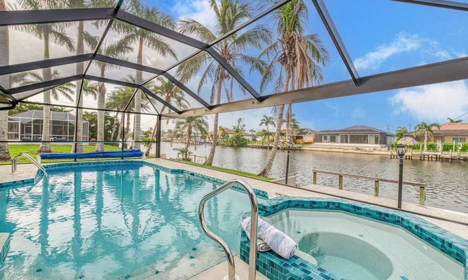 Pelican House | 3/2 updated Gulf access canal home heated pool & Jacuzzi - Coconut Cove