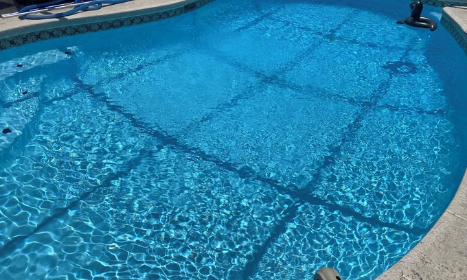 Arlington House | 3-bedroom house in Jacksonville with fenced backyard and screen enclosed pool.