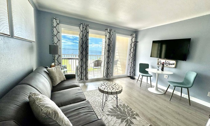 Rocky Point Apartment | 311 · Sophisticated Waterfront Getaway: Pool, Balcony, and Serene Views