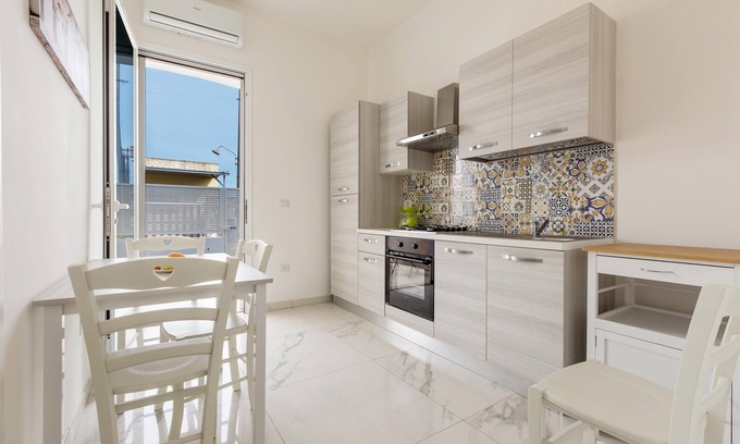 Padula Fede Apartment | 3700 La Spiaggetta - Bilo Lato by BarbarHouse