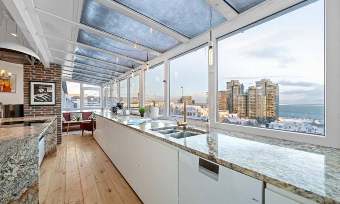 Hliðar Apartment | 3BR Penthouse with Stunning Mountain, Ocean, & City Views in Reykjavik's