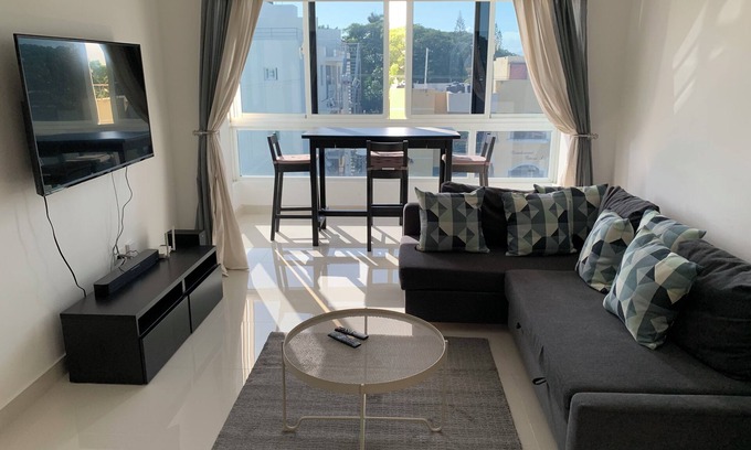 Santo Domingo Condo | 4-bedroom condo Steps from Ocean w/Pier, parking, WiFi, AC, parks & shopping.