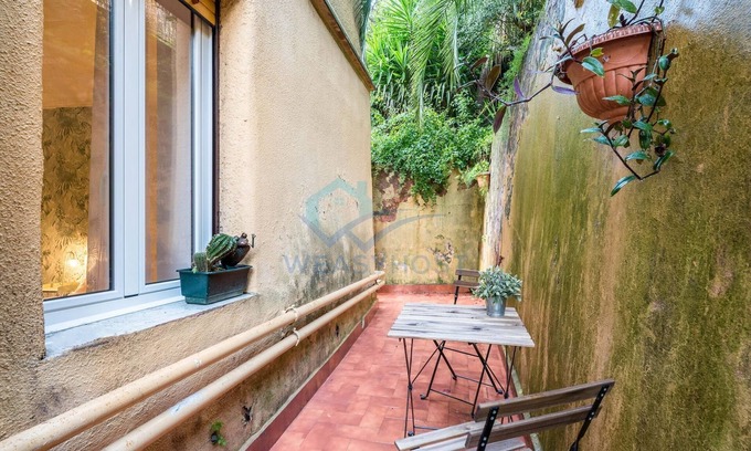 Suburbio XI della Vittoria Apartment | 42 - Augusto Conti · Tiny secret garden in Trionfa