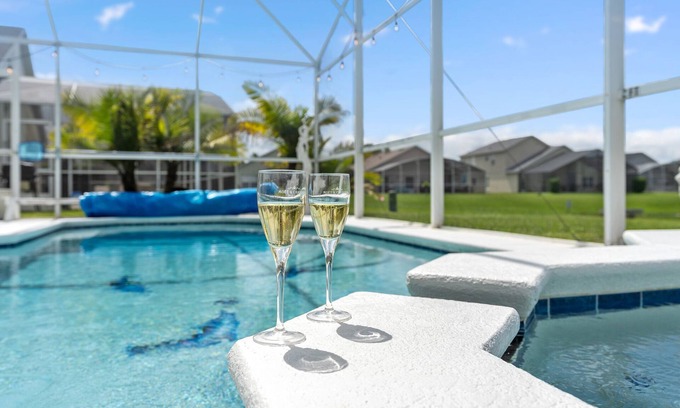 Liberty Village Villa | 4BR/3Bath Home, pool/spa, game room, lake view. Closer to ALL ATTRACTIONS