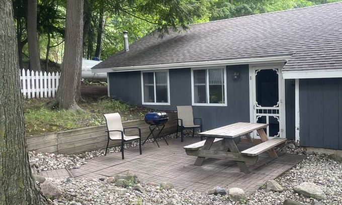 Ludington Cottage | #8 cottage comes with boat docks and shares over 600’ of frontage on Hamlin lake