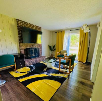 Maple Grove House | A Beautiful Self-contain room with a living room