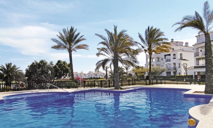 Roldan Apartment | A beautiful view of the lake and the golf course offers this modern equipped apartment.