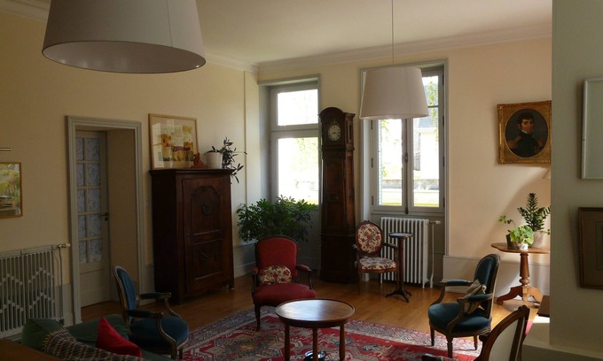 Faubourg North Apartment | 'a garden in the city': calm and charm close to the city center, with garage