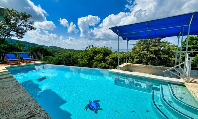Lawson Rock Apartment | A Modernist Paradise Overlooking the Caribbean Sea.
