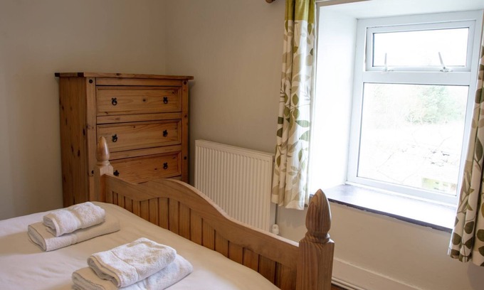 Clynnogfawr Cottage | A Semi-detached cottage with open plan living space, located in a fabulous setting.