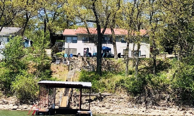 Grove House | A serene waterfront view with private dock. Spend quality family time and relax.