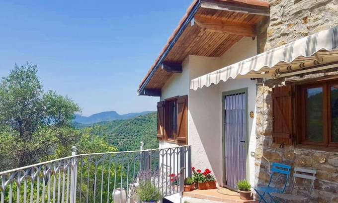 Berzi House | A unique village house with style & comfort looking out into a tranquil valley