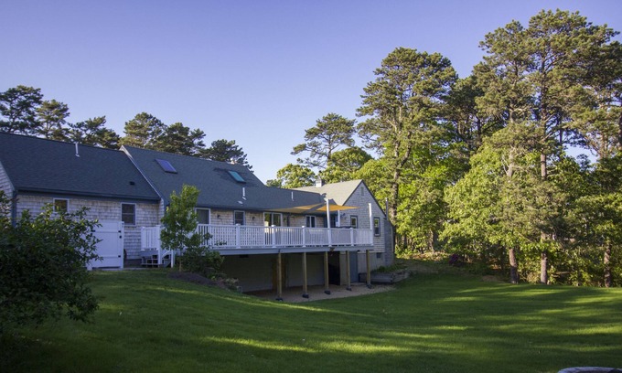 Eastham House | A Wonderful Family Vacation Home with a Huge Deck, game room, and Big Backyard!