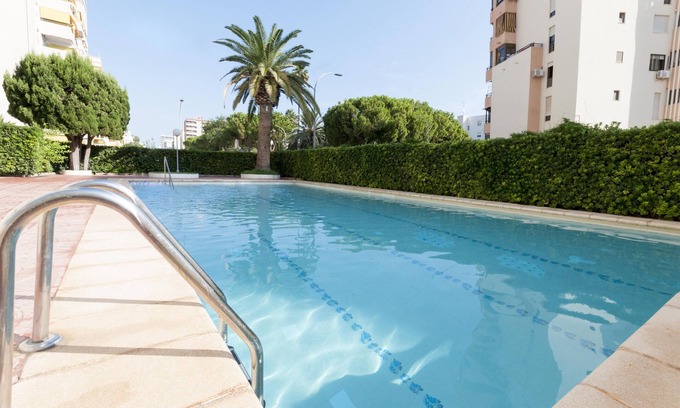 Grau i Platja House | ACAPULCO IV - Apartment with shared pool in Playa de Gandia. Free WiFi