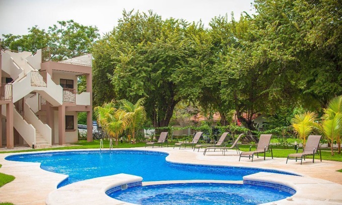 Coco Condo | Across the Street from the Ocean with a Private Rooftop Terrace