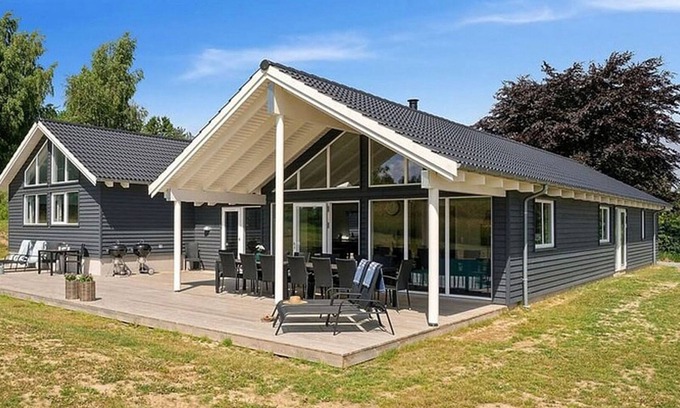 Vejby House | Activity house on a large lawn with pool and XL kitchen