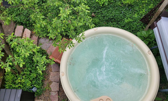 Traverse City Cottage | Adorable peninsula cottage orchard with private hot tub - near vineyards