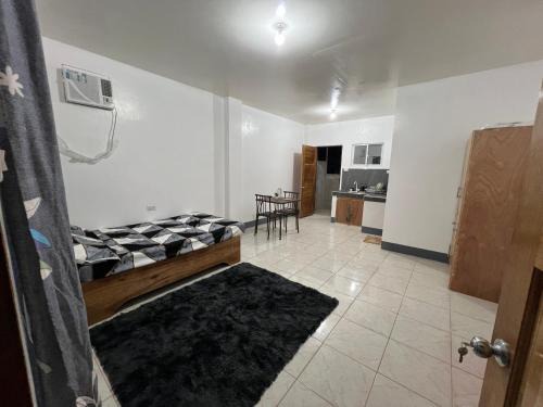 Del Carmen Apartment | Affordable Apartelle 15mins to the Airport Airport & Sugba Lagoon-Triple Beagle Apartment