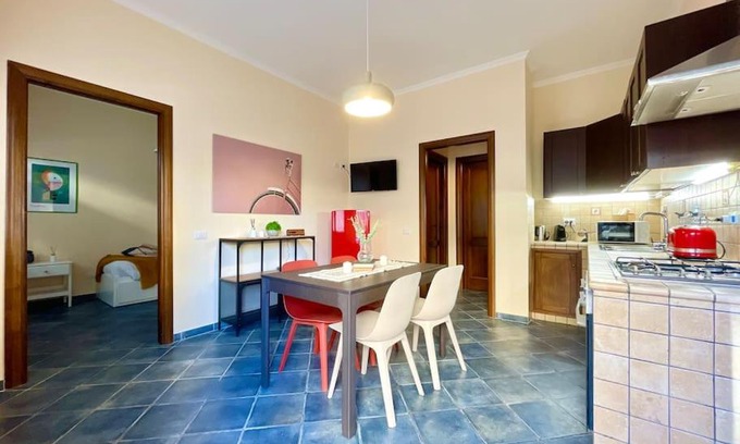 Fiumicino Apartment | [airport suite]overlooking old town and riverfront