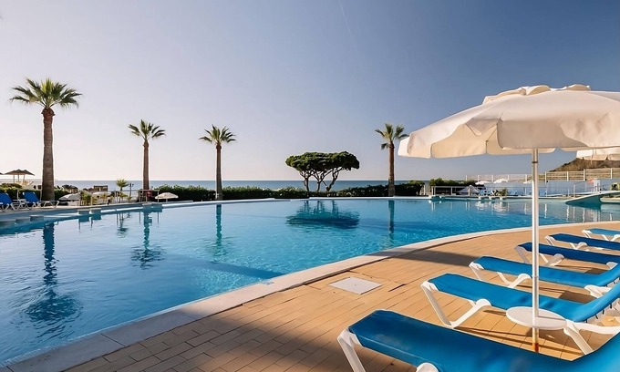 Oura Hotel | Albufeira Beach Apartment with Sky Bar Water Slide and Family Perks