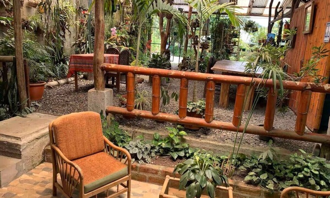 Banos de Agua Santa Cabin | Amanecer Amazonico - Rustic cabin with Amazon rainforest view