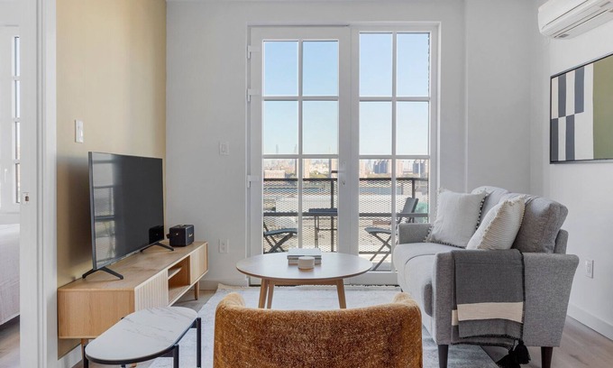 Vinegar Hill Apartment | Amazing Dumbo 2BR w/W/D, Roof & Gym, nr TimeOut Building, by Blueground