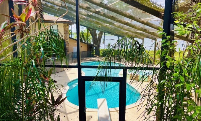 Winter Haven House | Amazing Lakefront Views! 4/4, Pool, Diving Board, Spa, Pool Table, near LegoLand