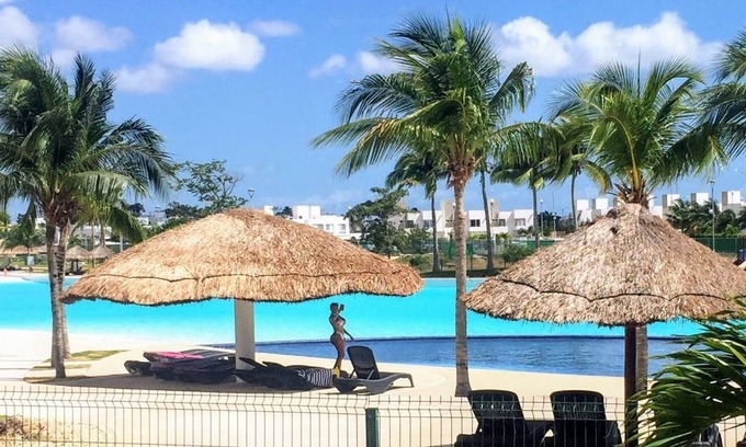 Cancun Apartment | Amazing View of the lagoon from The big Terrace, Ground Floor Apartment.