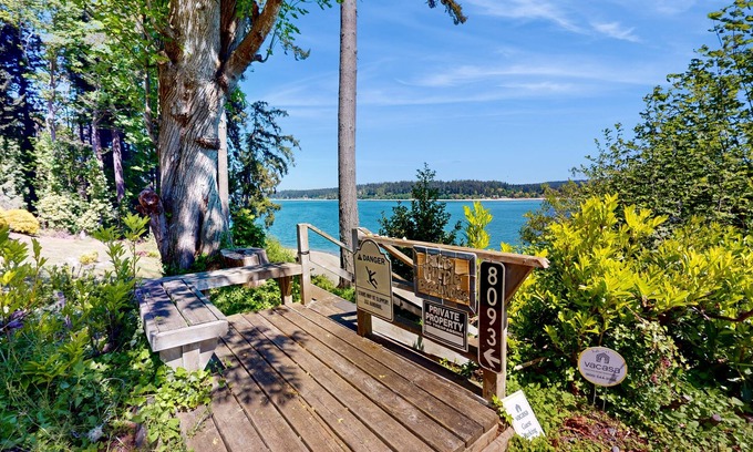 Rollingbay House | Amazing waterfront home with dock, lanai, W/D, & dog-friendly