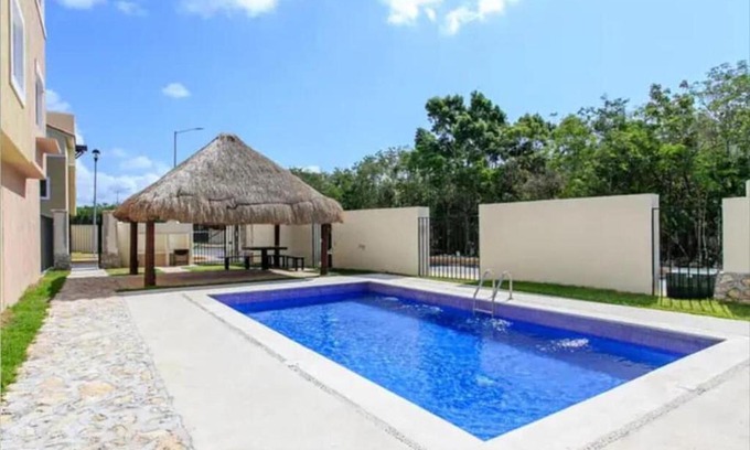 Puerto Juarez Apartment | Amplio Departamento a 10 Min de la Playa con Alberca e Internet