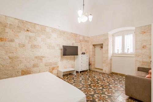 Turi Apartment | Antiche Mura Apartments"Bianco di Puglia" cucina 1 camera da letto più divano letto
