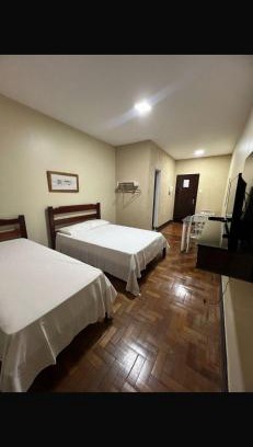 Patos de Minas Apartment | Apartamento 113 - Suíte com ar condicionado