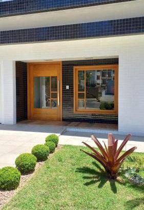 Torres House | Apartamento com 2 Dormitórios no Coração da Praia Grande - Torres/RS