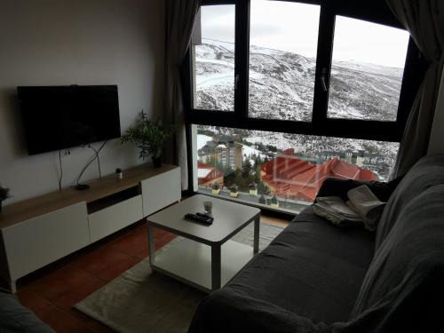 Pradollano Apartment | Apartamento en Sierra Nevada, próximo a pistas y plaza central, vistas increíbles