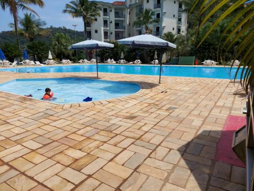 Toninhas Apartment | Apartamento Wembley Tenis - H402
