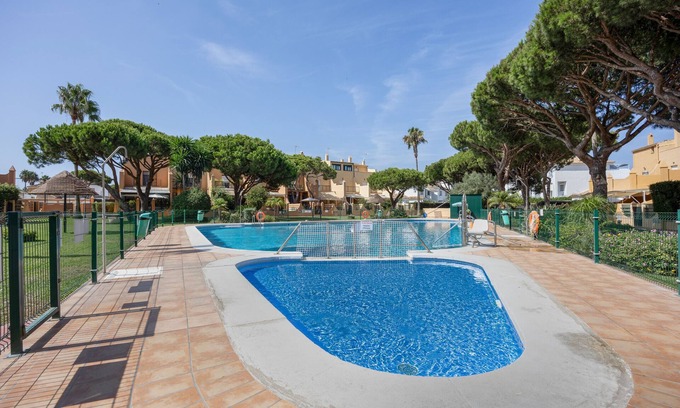 Poblado Sancti Petri Apartment | Apartment 'Apartamento Arrecife D' with Sea View, Shared Pool and Wi-Fi
