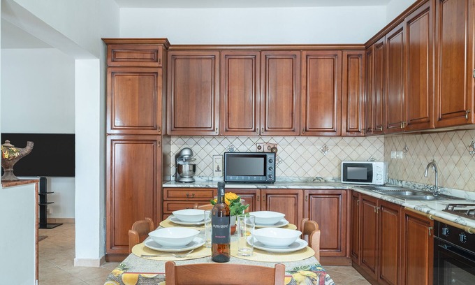 Punta Milocca Apartment | Apartment 'Casa Vivaldi Vista Giardino' with Sea View, Wi-Fi and Air Conditioning