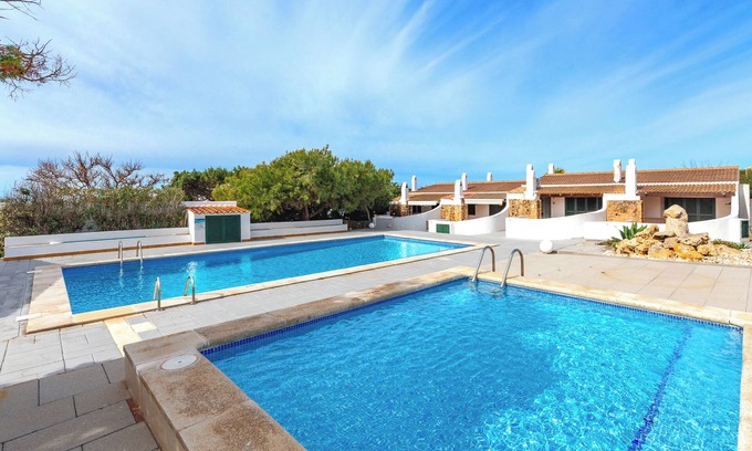 Cap d'Artrutx Apartment | Apartment 'Casita del Faro' with Shared Pool, Wi-Fi and Air Conditioning