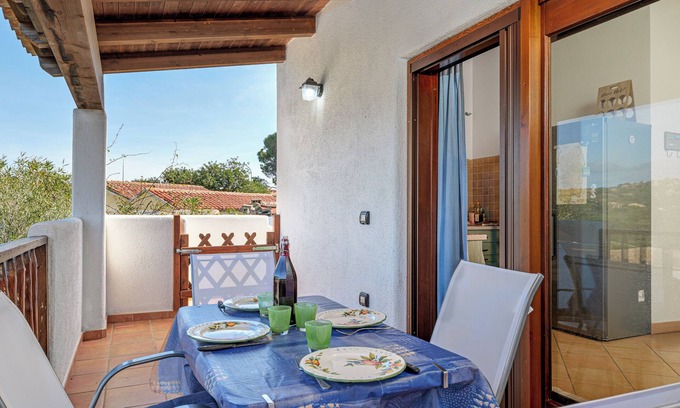 Monte Petrosu Apartment | Apartment 'Con Vista Porto Taverna' with Sea View, Private Terrace and Air Conditioning
