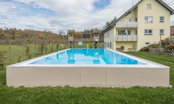 Tettnang Apartment | Apartment “Dahlie” on Farm close to Lake Constance with Terrace, Garden & Pool