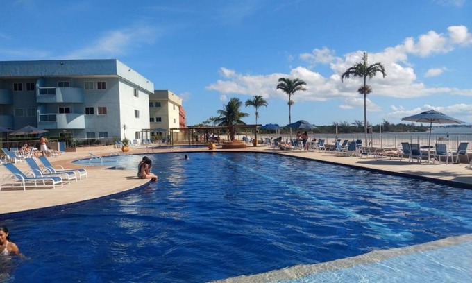 Arraial do Cabo Apartment | Apartment in Golden Lake residence - with foot in the sand, coconut water and beer