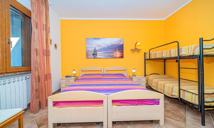 Capoliveri Apartment | Apartment in villa 2 to 4 persons with large private garden Sole