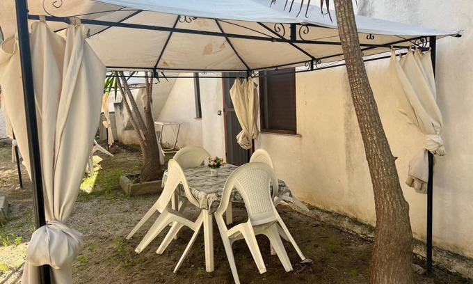 Palmi Apartment | Apartment 'La Quiete - Gazebo Esterno 1' with Shared Pool, Wi-Fi and Air Conditioning