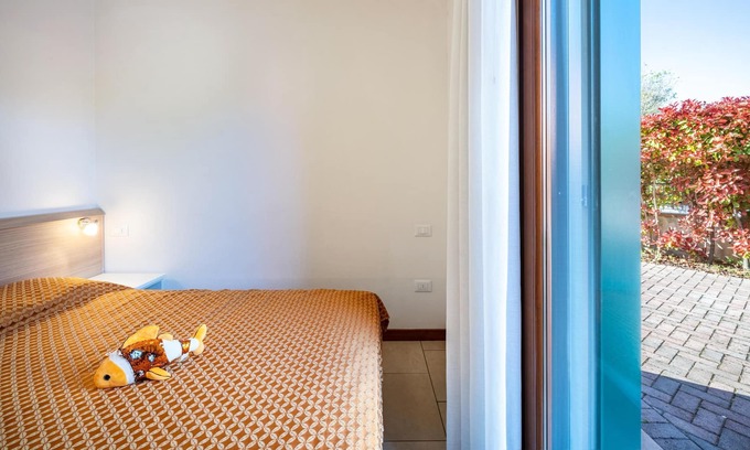 Caorle Apartment | Apartment 'Piramidi 05' Near the Beach with Air Conditioning & Garden